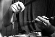 Hände mit Drumsticks